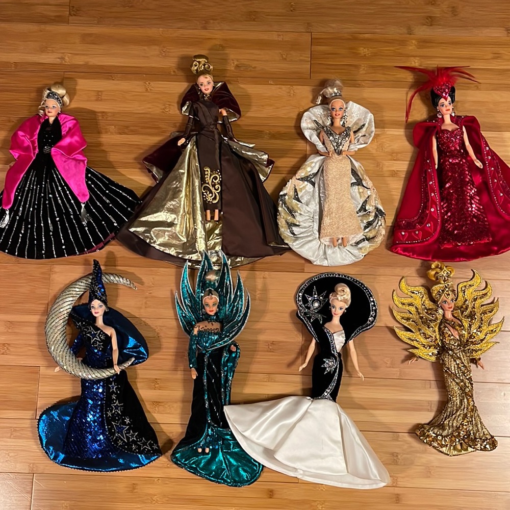 8 vintage barbie dolls